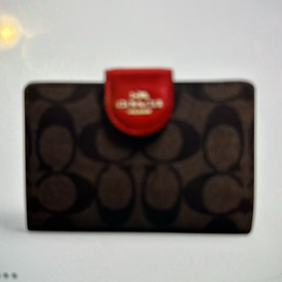Coach Handbags - Coach Medium Corner Zip wallet in Signature Canvas